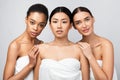 Three Sensual Girls Wrapped In Bath Towels Posing In Studio