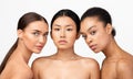 Three Sensual Models Girls Posing Naked Over White Studio Background