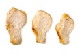 Three separated slices of grilled chicken breast isolated on white. Top view