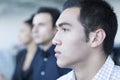 Three serious business people sitting in a business meeting Royalty Free Stock Photo