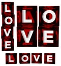 Three sets of 3D rendered red dice with white LOVE lettering Royalty Free Stock Photo