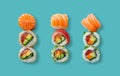 Three sets of succulent, bright and vibrant salmon sushi roll, with sushi rice and rocket salad on a light blue background Royalty Free Stock Photo