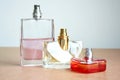 Three shapes of perfume bottles. Royalty Free Stock Photo