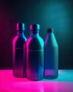 Three shiny bottles are sitting on a table. AI generative image