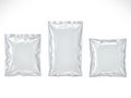 Three shiny foil packages Royalty Free Stock Photo