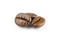 Three shiny fresh roasted coffee beans isolated on white background. Coffee background or texture concept. Royalty Free Stock Photo