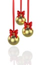 Three shiny gold christmas balls with red baw. 3D Illustration Royalty Free Stock Photo