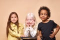 Three shy and calm diverse kids isolated Royalty Free Stock Photo