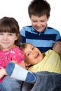 Three Siblings Playing at Home Royalty Free Stock Photo