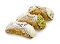 three Sicilian cannoli, Italian pastries, classic, pistachio, chocolate