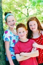 Three siblings outdoors Royalty Free Stock Photo
