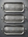 Three silver trays with handles, shiny and elegant, placed in a row against a plain background., Generative AI