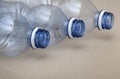 three single use plastic water bottles with copy-space Royalty Free Stock Photo