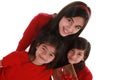 Three sisters holding presents Royalty Free Stock Photo