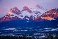 Three sisters mountain view at sunrise time in Canmore town, Canada Royalty Free Stock Photo