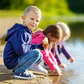 Three sisters and their brother having fun Royalty Free Stock Photo