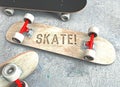 Three skateboards with lettering lying on the concrete floor