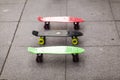 Three skateboards stand on the pavement Royalty Free Stock Photo