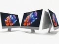 Three sleek all-in-one computers on a white surface Royalty Free Stock Photo