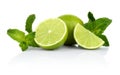 Three sliced limes with mint isolated on a white background Royalty Free Stock Photo