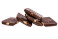 three slices of dark chocolate with nuts isolated on white background Royalty Free Stock Photo