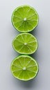 three slices of green lime on a white background Royalty Free Stock Photo