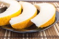 Three slices of juicy yellow melon closeup Royalty Free Stock Photo