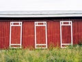 three sliding doors on an old warehouse Royalty Free Stock Photo