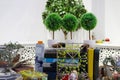 Three small artificial trees, other decorations