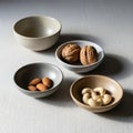 Three small bowls, each containing different Royalty Free Stock Photo