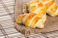 Small croissants  with checkered napkin in background Royalty Free Stock Photo