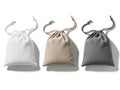 Three small drawstring bags in different colors isolated on white background Royalty Free Stock Photo
