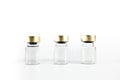 Three small empty glass vials on a white background. Medicine bottles. Copy space Royalty Free Stock Photo