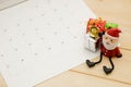 Three small gift box and satan claus put on wooden background Royalty Free Stock Photo