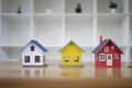 Three small house model on an architects table. New house, insurance and real estate concept Royalty Free Stock Photo