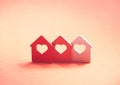 Three small houses with heart Royalty Free Stock Photo