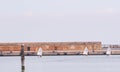 Three, small, sailboat with young captains, racing into the Adriatic Sea