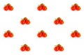 Three small tomatoes red cherry branch, group of berries on a white background pattern contrasting juicy base