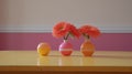 three small vases with flowers in them on a wooden table with a pink wall in the background and a pink wall in the background