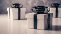 Three small white boxes with black bows sitting on a table, AI Royalty Free Stock Photo