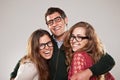 Three smart student friends looking with eyeglasses Royalty Free Stock Photo