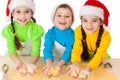 Three smiling kids showing dough Royalty Free Stock Photo