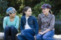 Three Smiling Tween Girls Outdoors