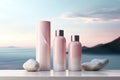 three soft pink bottles of cleansers and lotion are on a white background