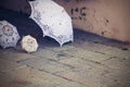 Three solar umbrellas are located on the sidewalk