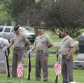 Three Soldier Veterans in graveyard Royalty Free Stock Photo
