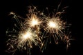 Three sparklers on a black Royalty Free Stock Photo