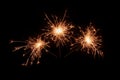 Three sparklers firework on black background. Christmas celebration Royalty Free Stock Photo