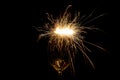 Three sparklers in a wine glass on a black Royalty Free Stock Photo