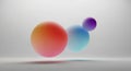 Three spheres of varying sizes hover against a neutral background. The largest sphere Royalty Free Stock Photo
